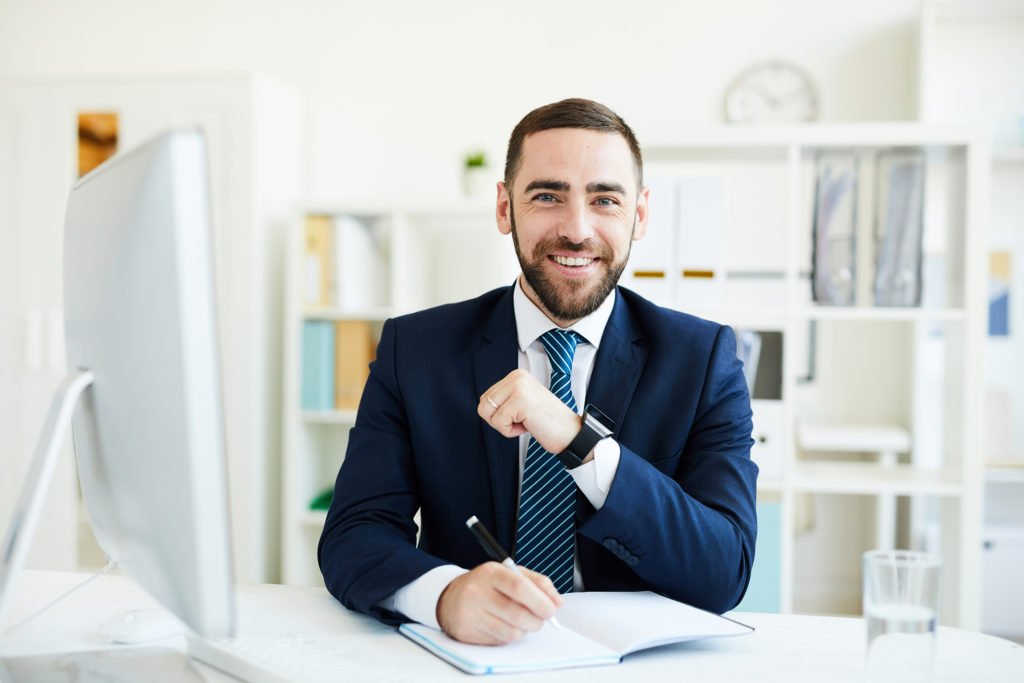a man sitting at a desk